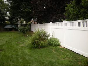 traditional style white vinyl privacy fence