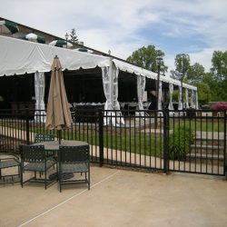 aluminum fence surrounding a commercial pavilion