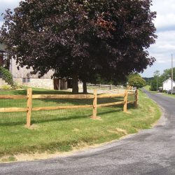 simple 2 rail wooden horse fence