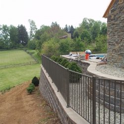 textured bronze aluminum fence for a residential property