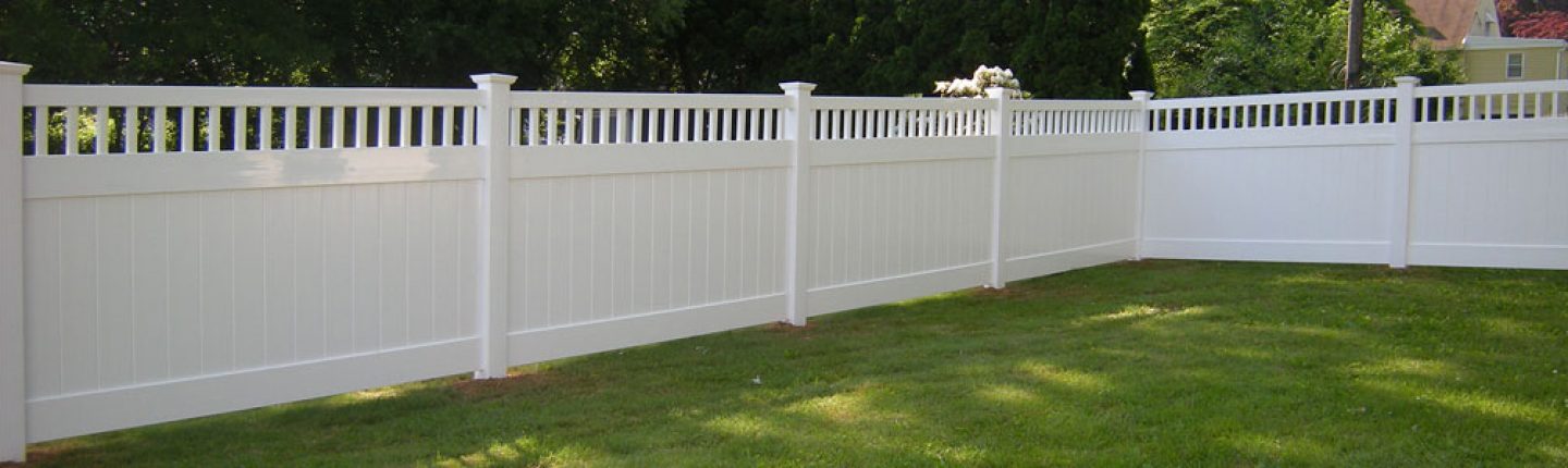 White vinyl fence installed in neighborhood