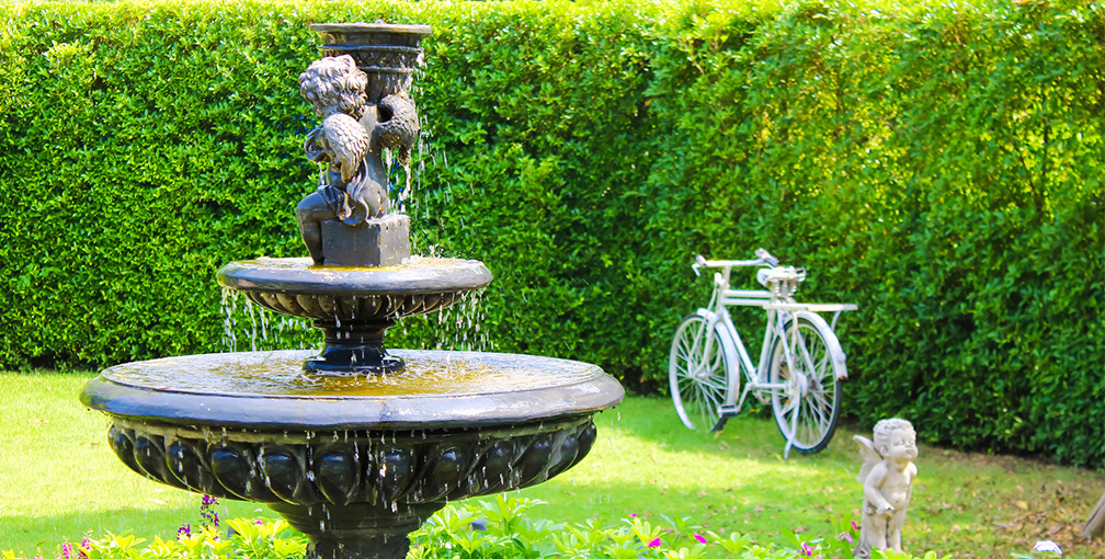 Decorative Water Fountain in Residential Yard