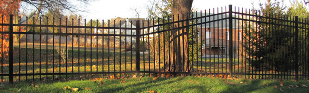 Aluminum grade fence in residential yard