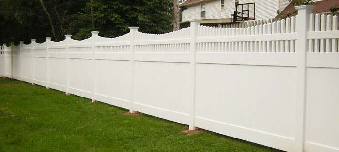 White vinyl privacy fence with picket top