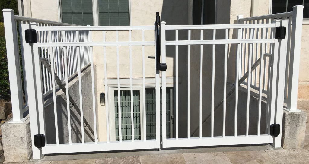 White fence around home exterior 