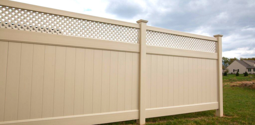 Tan vinyl fencing for backyard privacy