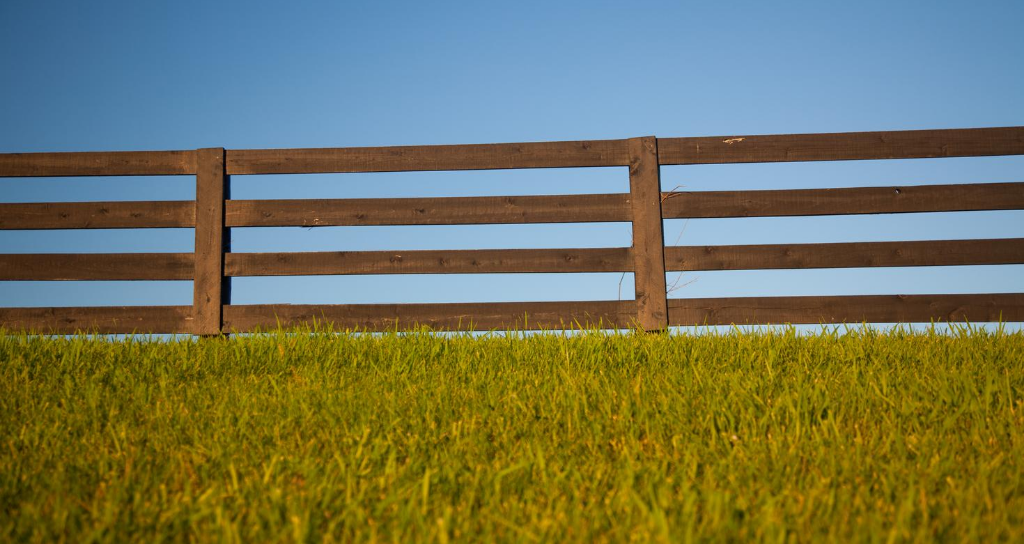 Wood fence for securing property
