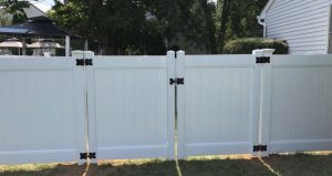 White Vinyl Fencing Installed in Wintertime