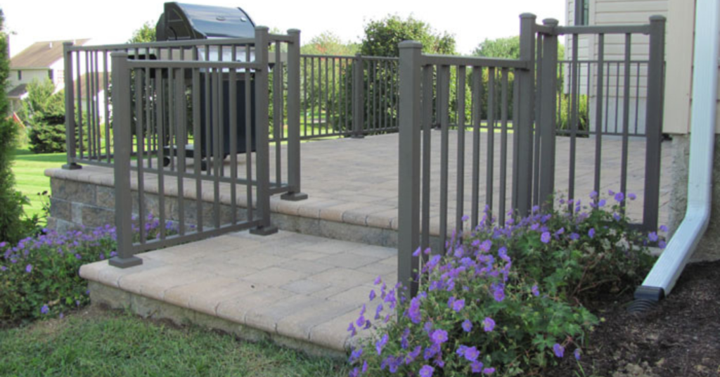 best railing material for backyard stone patio attached to home