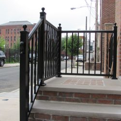 black aluminum railing installation on steps