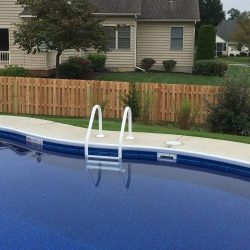 shadowbox wood pool safety fence installation