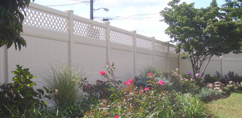 best fence material showing in white vinyl fence with lattice top